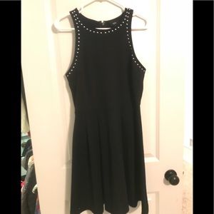 Black fit and flare dress with pleats and studs